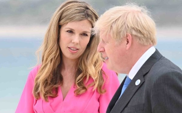 CARBIS BAY, CORNWALL - JUNE 11: Prime Minister of United Kingdom, Boris Johnson, and wife Carrie Johnson, arrive for the Leaders official welcome and family photo during the G7 Summit In Carbis Bay, on June 11, 2021 in Carbis Bay, Cornwall. UK Prime Minister, Boris Johnson, hosts leaders from the USA, Japan, Germany, France, Italy and Canada at the G7 Summit. This year the UK has invited India, South Africa, and South Korea to attend the Leaders' Summit as guest countries as well as the EU.