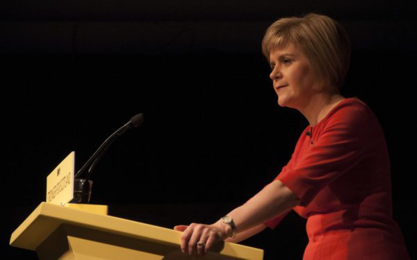 Nicola Sturgeon SNP leader in a red dress