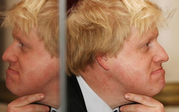 Boris Johnson (reflected in a TV screen)