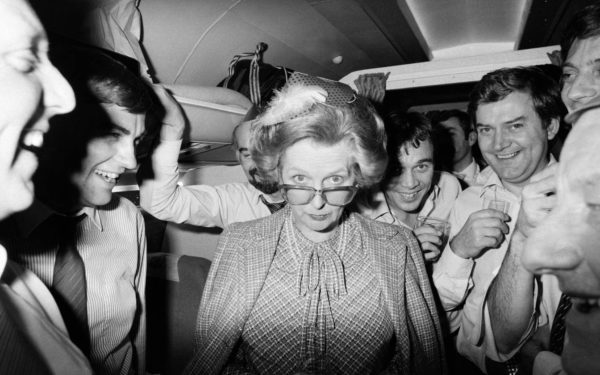 Margaret Thatcher British Prime Minister - December 1984 relaxes at an impromptu party on board the VC-10 plane with Downing Street Staff and Press,