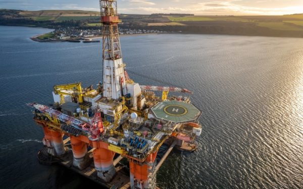 Close up aerial view of an oil and gas drilling rig, UK.