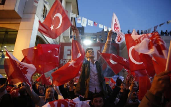 Supporters of Turkish President Tayyip Erdogan celebrate in Istanbul (via Orlok/ Shutterstock)