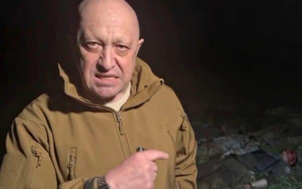 Bakhmut, Ukraine. 05th May, 2023. Russian Yevgeny Prigozhin, owner of the Wagner Group of mercenaries, points to the bodies of his soldiers as he broadcasts a tirade against Russian Defense Minister Sergei Shoigu accusing the military command of starving his forces of ammunition and supplies, May 4, 2023 near Bakhmut, Ukraine. Prigozhin, standing in a field of bodies threatened to withdraw from the frontlines.