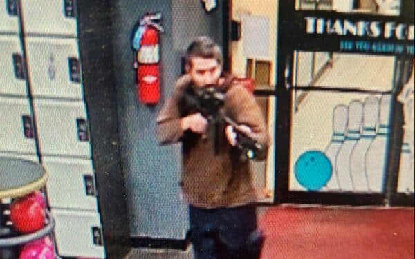 Video released by the Androscoggin County Sheriff's Office shows the gunman entering Sparetime Recreation in Lewiston, Maine, on Oct. 25, 2023 (via AP/ Alamy) Maine mass shooting