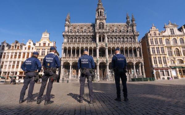 Police officers in Brussels, Belgium (via Berny-1/ Shutterstock)
