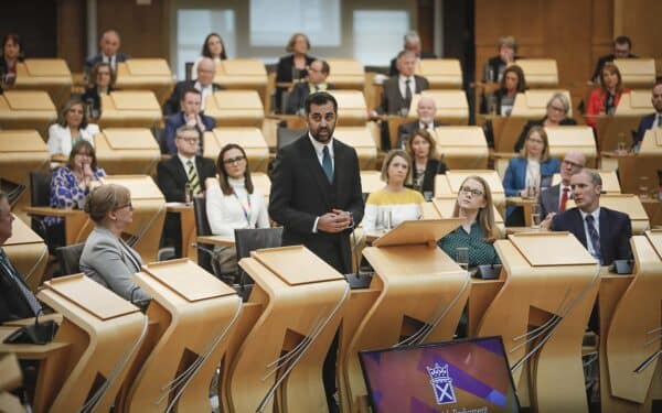 First Minster Humza Yousaf makes a speech to the Scottish Parliament chamber