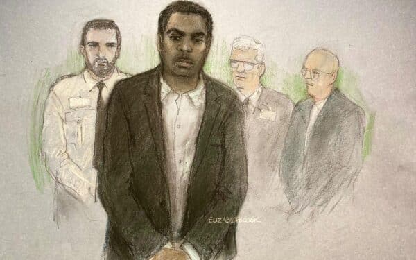 Court artist sketch by Elizabeth Cook of Valdo Calocane, 32, appearing at Nottingham Crown Court charged with the murders of Grace O'Malley-Kumar, Barnaby Webber and Ian Coates, and the attempted murder of three others, in a spate of attacks in Nottingham on June 13 2023 (via PA Images/ Alamy)