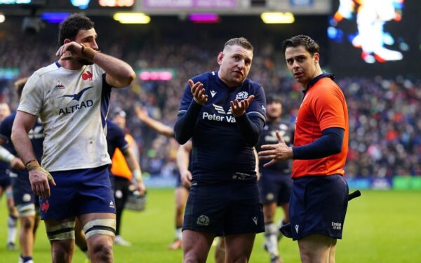 Scotland's Finn Russell speaks to referee Nika Amashukeli as they wait for a TMO decision on a Scotland try late in the Guinness Six Nations match at the Scottish Gas Murrayfield Stadium, Edinburgh. Picture date: Saturday February 10, 2024.