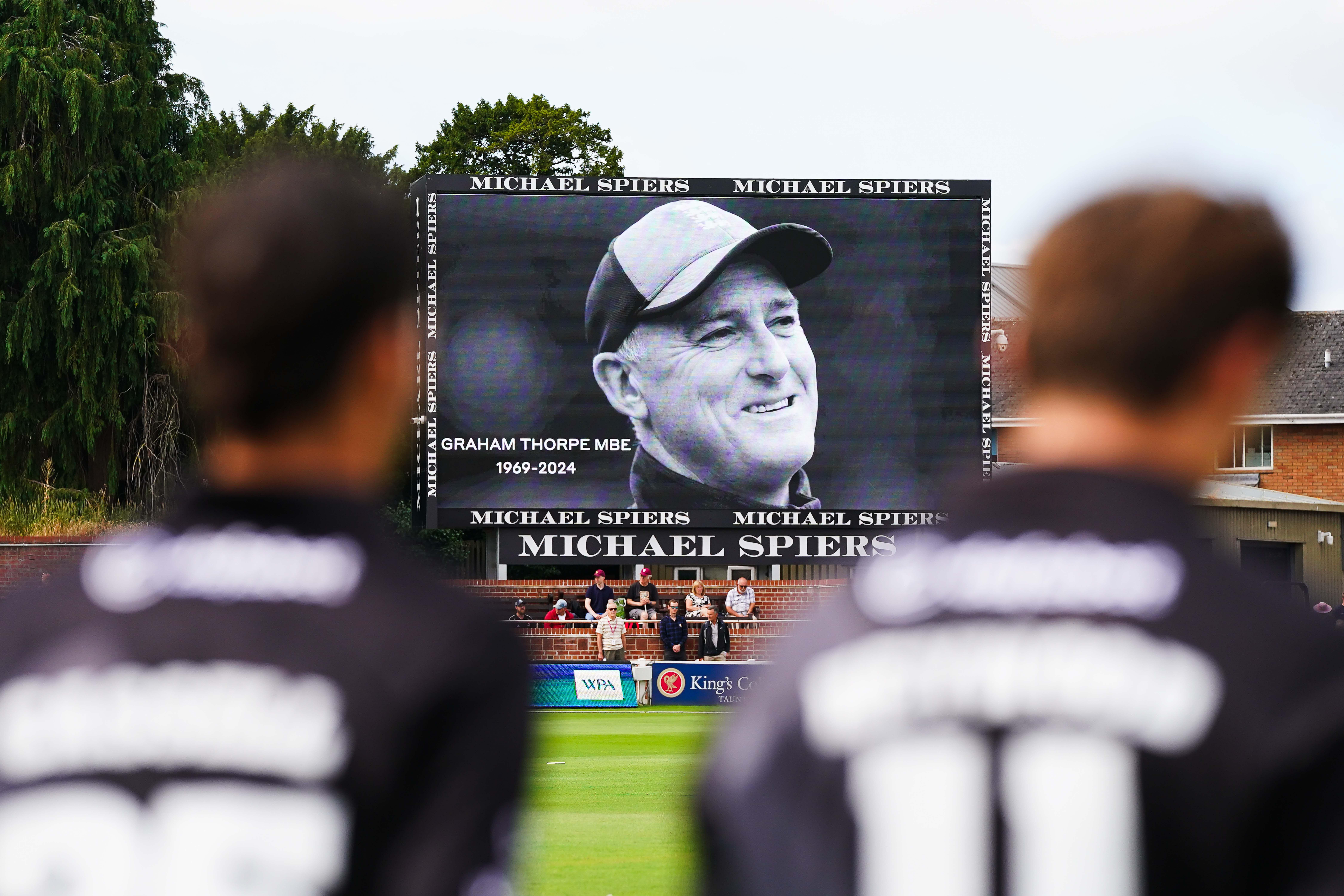 A minutes silence is held in the memory of Graham Thorpe during a match between Somerset and Worcestershire. (Robbie Stephenson via Alamy Live News)