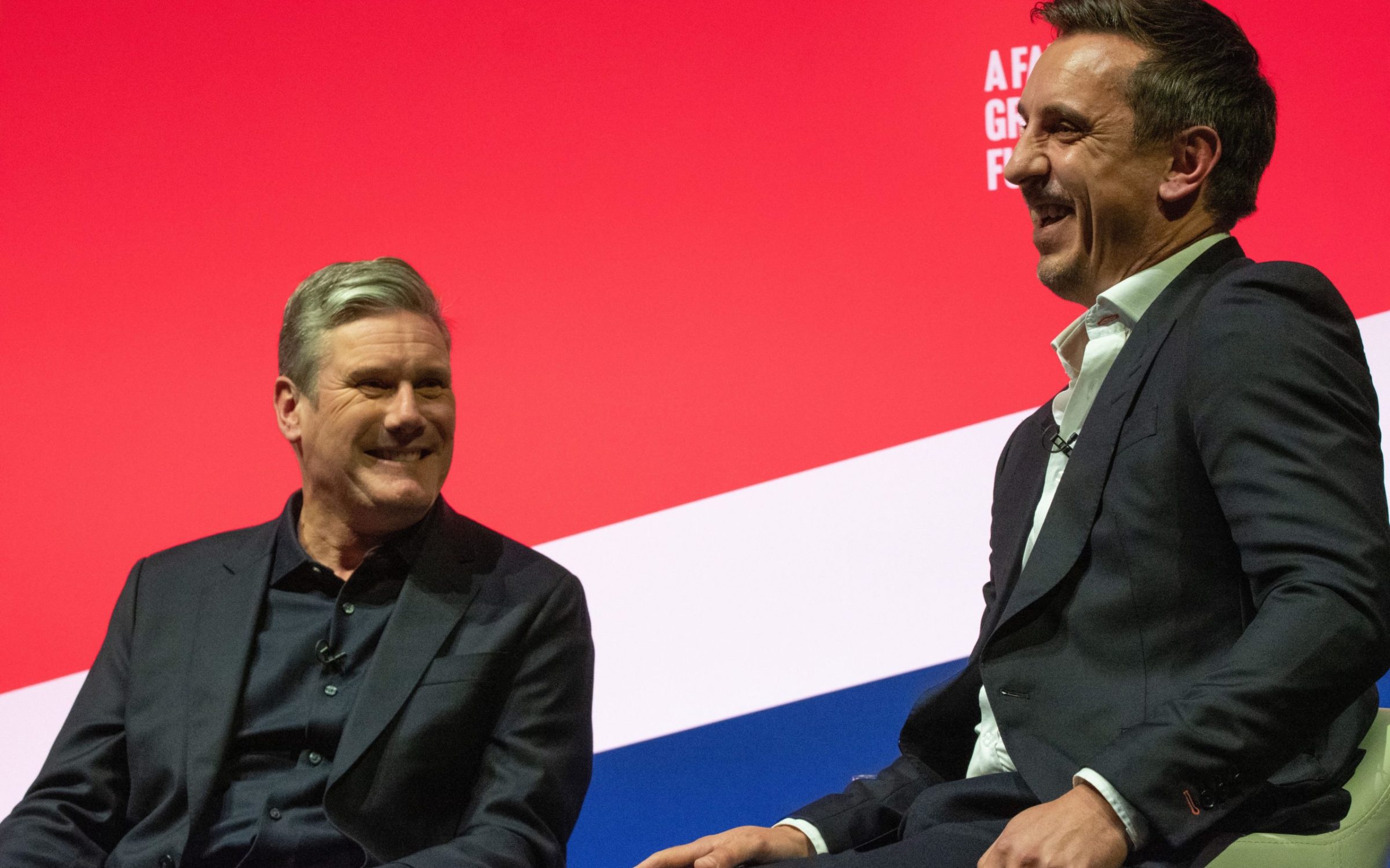Liverpool, UK, 26.September 2022 Keir Starmer and Gary Neville in conversation with questions from Lucy Powell at Labour conference in Liverpool. Liverpool Kings Dock. Liverpool UK. Picture: gary
