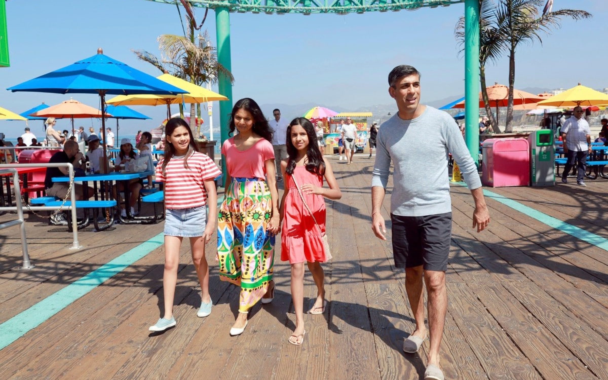 British Prime Minister Rishi Sunak, his wife Akshata Murty and daughters Anoushka and Krishna, left, at Santa Monica Pier, in Santa Monica, California, on their summer holiday (via Emma McIntyre/ AP/ Alamy)