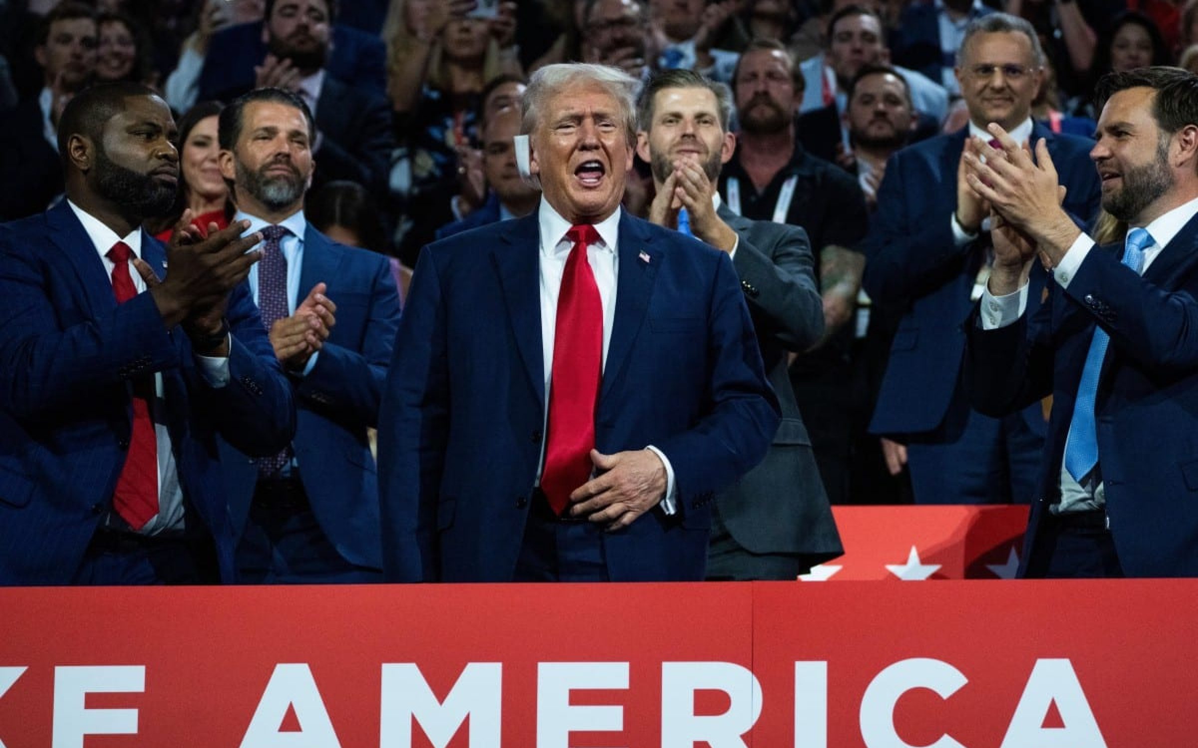 Donald Trump, the Republican presidential nominee, is pictured with his running mate Sen. J.D. Vance, R-Ohio, right, in Fiserv Forum on the first day of Republican National Convention in Milwaukee