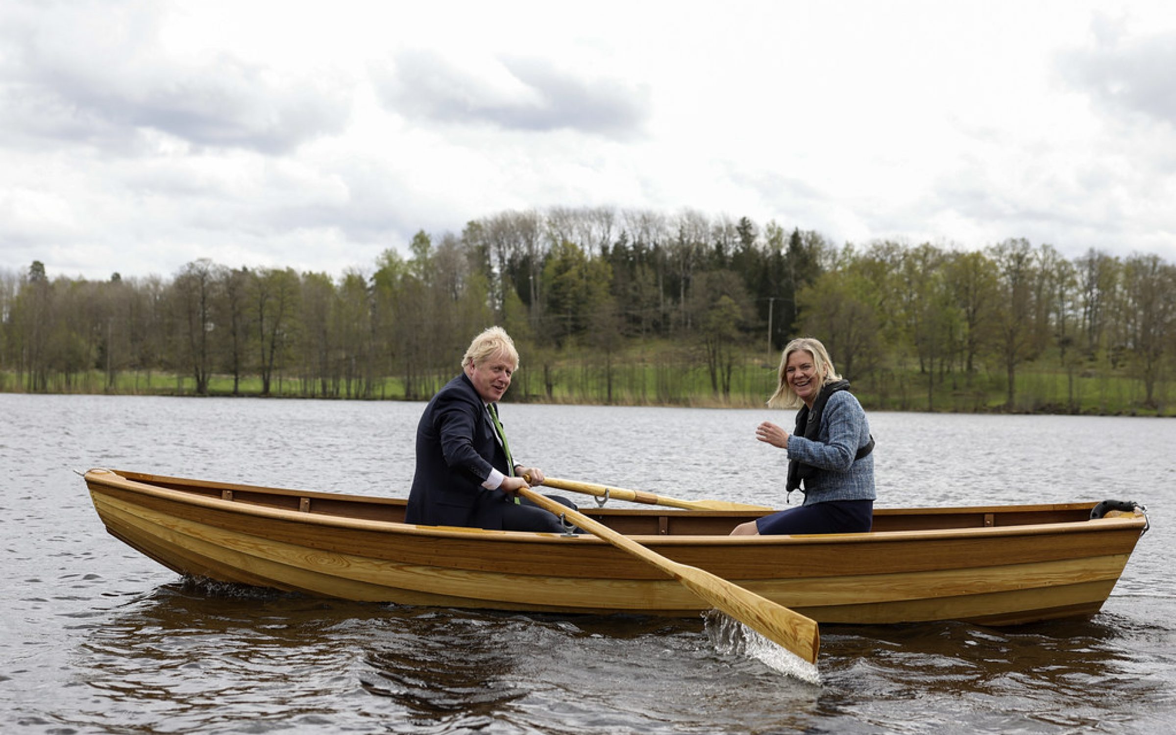 Prime Minister Boris Johnson rows a boat with Magdalena Andersson, Prime Minister of Sweden after a bilateral meeting in Stockholm during a visit to the Nordic regions.