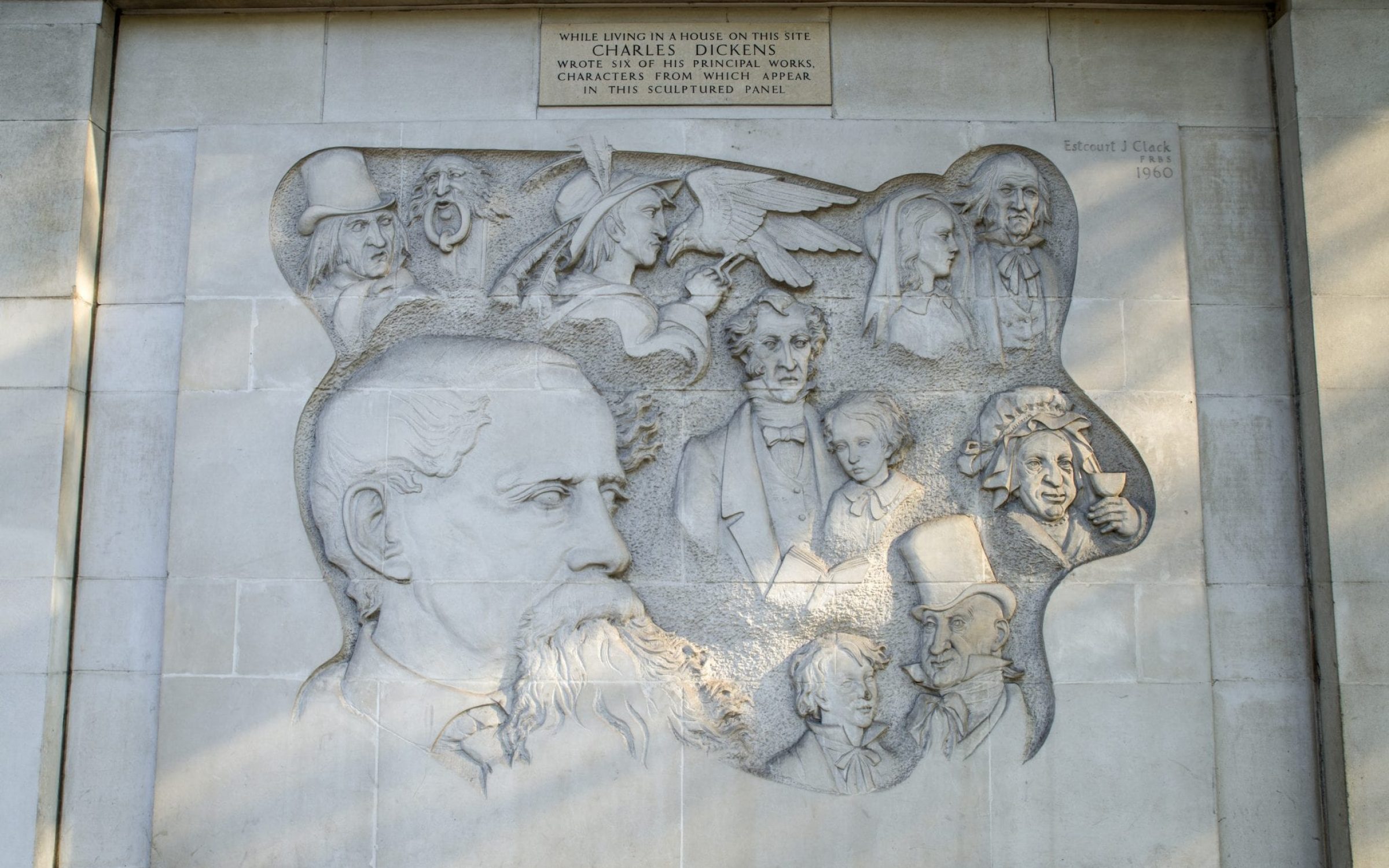 Bas Relief Carving of Charles Dickens Characters in London