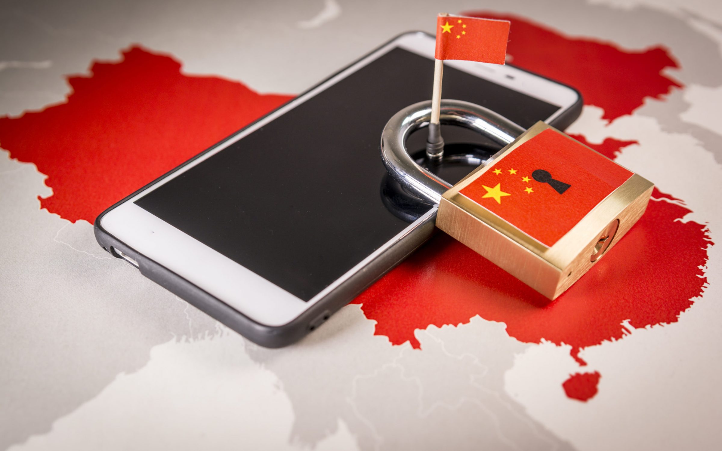 Padlock, China flag on a smartphone and China map. Great Firewall of China concept