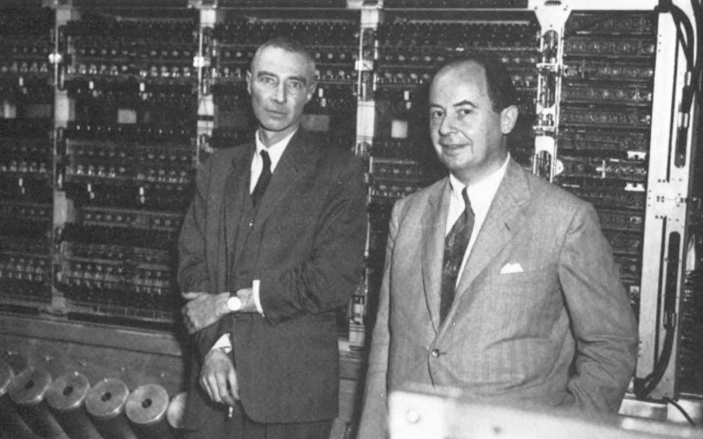 FF8X90 JOHN von NEUMANN (1903-1957)./nThe American (Hungarian-born) mathematician, right, with J. Robert Oppenheimer at the 1952 dedication ceremony for the computer built at the Institute for Advanced Study, Princeton, New Jersey, of which Neumann was director.