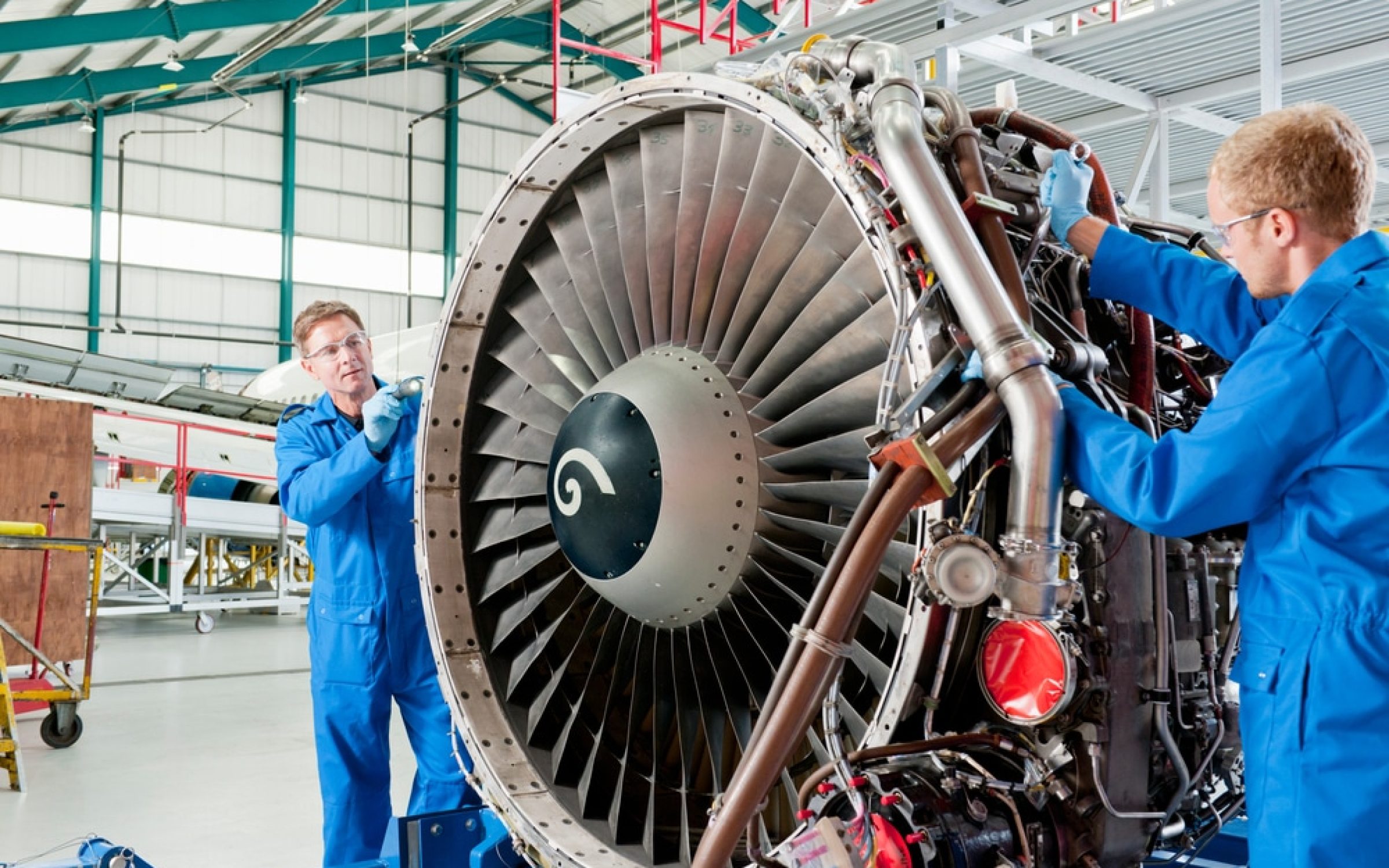 Engineers working on aerospace manufacturing