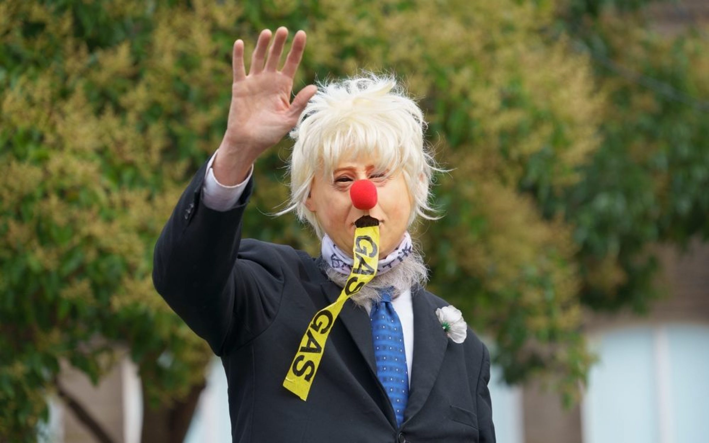 COP26 climate protester dressed as Boris Johnson