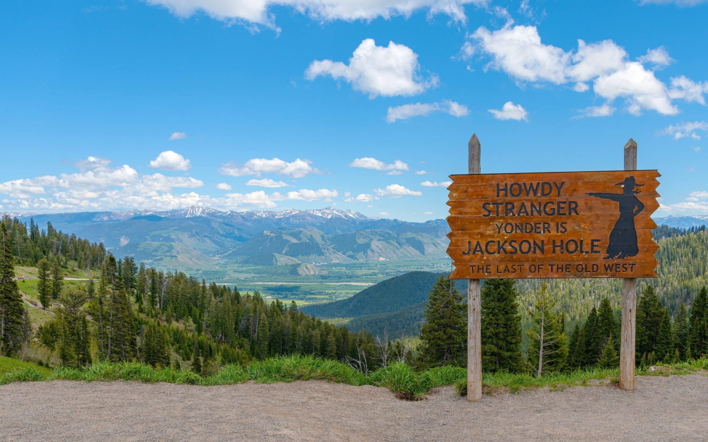 Welcome posted of Jackson hole viewpoint looking down to the valley with the Tetons mountains Wyoming state.