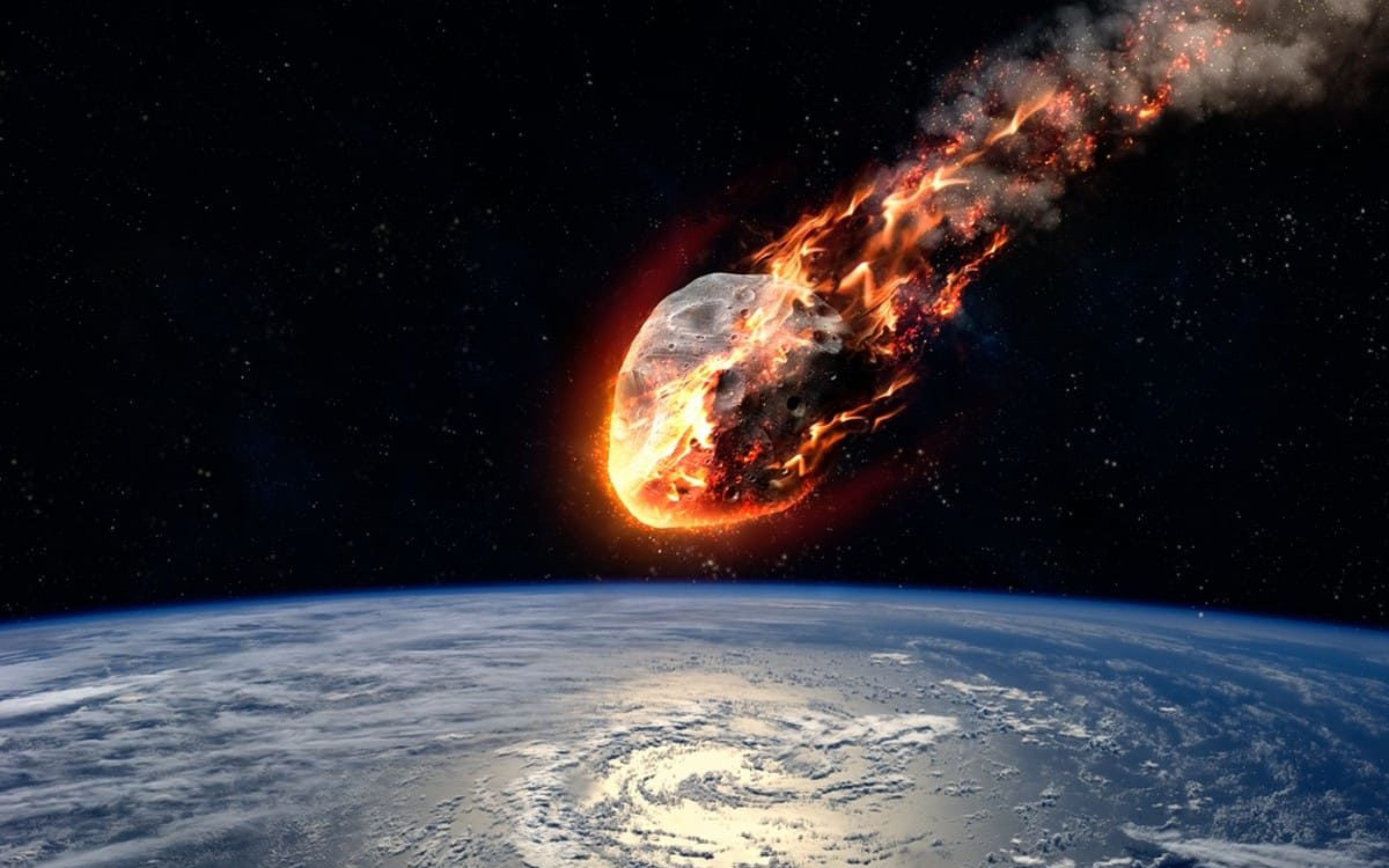 A Meteor glowing as it enters the Earth's atmosphere. Elements of this image furnished by NASA